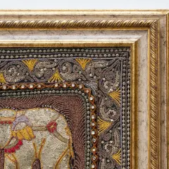 Dettagli di un arazzo con elefante ricamato, paillettes e perline. Un esempio di come riconoscere un arazzo di valore.