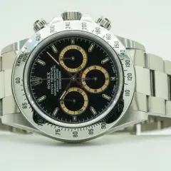 Rolex Daytona watch with black dial and tachymeter bezel.