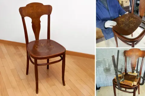 Parti di una sedia in legno con intarsi floreali. Una seduta viene rimossa, un'altra è fissata con morsetti.