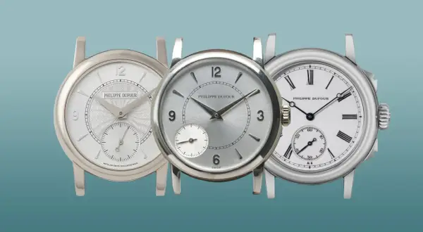 Tre orologi di lusso Philippe Dufour, ognuno con un quadrante unico, mostrano l'artigianato svizzero.