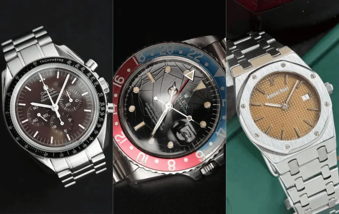 Tre orologi iconici: Omega Speedmaster, Rolex GMT-Master e Audemars Piguet. La patina del tempo dona un fascino unico a questi pezzi da collezione.
