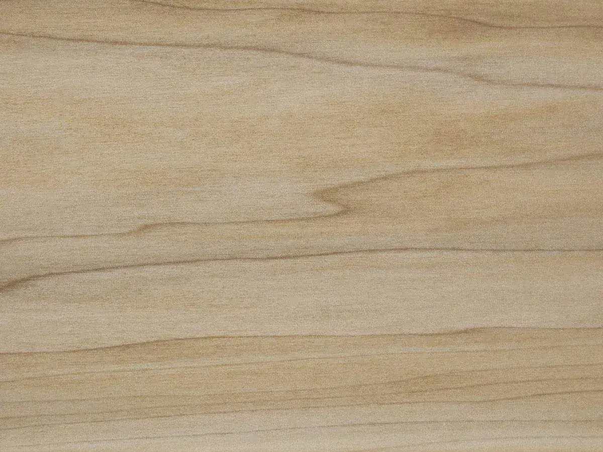 Trama chiara e uniforme del legno di pioppo, con venature sottili e ondulate che creano un motivo naturale e rilassante.