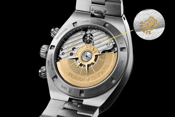 Dettaglio del movimento di un orologio Vacheron Constantin con il punzone di Ginevra, simbolo di eccellenza orologiera.